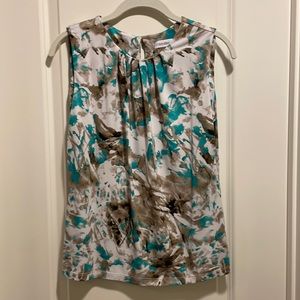 Calvin Klein sleeveless white print top size M.